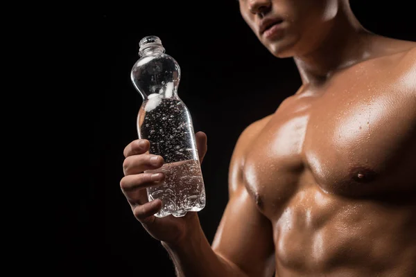 Shirtless sportsman drinking water — Stock Photo