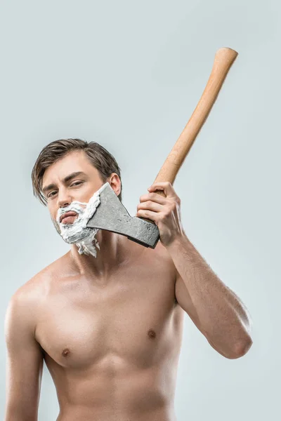 Man shaving with ax — Stock Photo