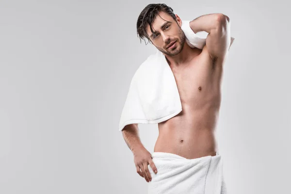 Shirtless man with towel — Stock Photo