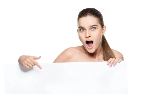 Beautiful woman holding a blank billboard — Stock Photo