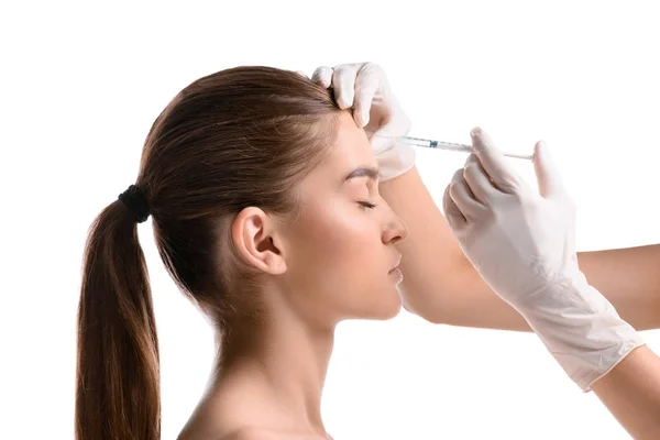 Mujer que recibe la inyección de Botox - foto de stock