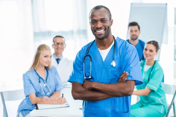 Doctor with crossed arms — Stock Photo