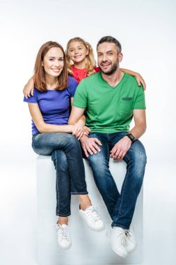 Young parents with their daughter clipart