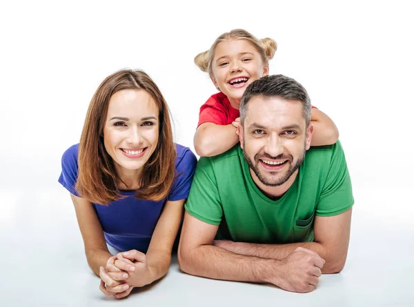 Smiling parents with cute little daughter — Stock Photo, Image