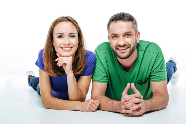 Couple lying and looking at camera — Stock Photo, Image