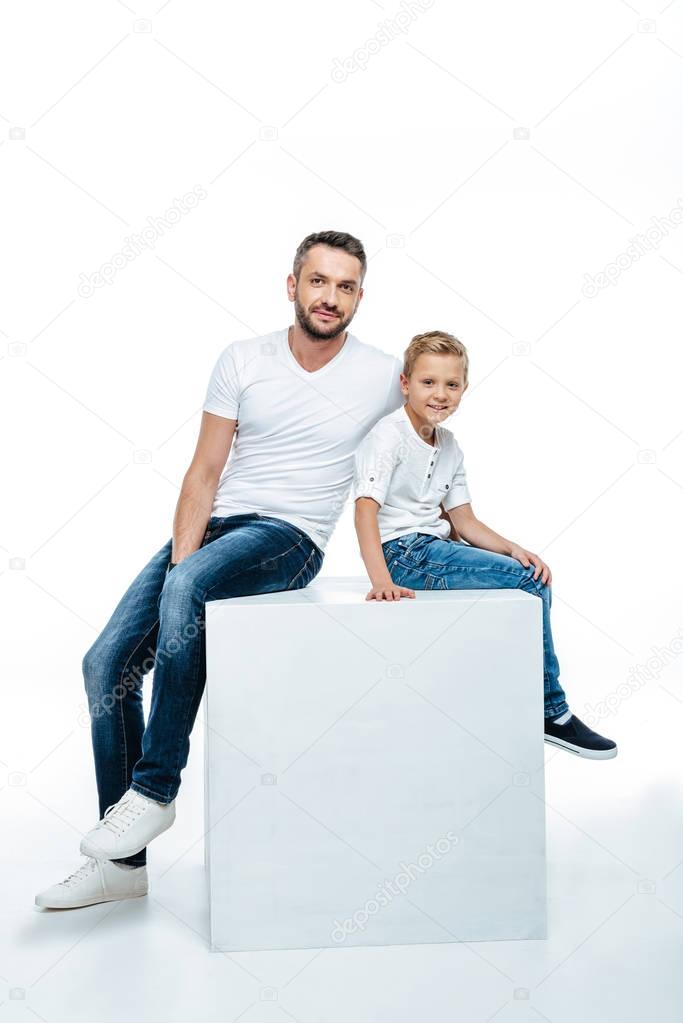 Smiling father with cute little son