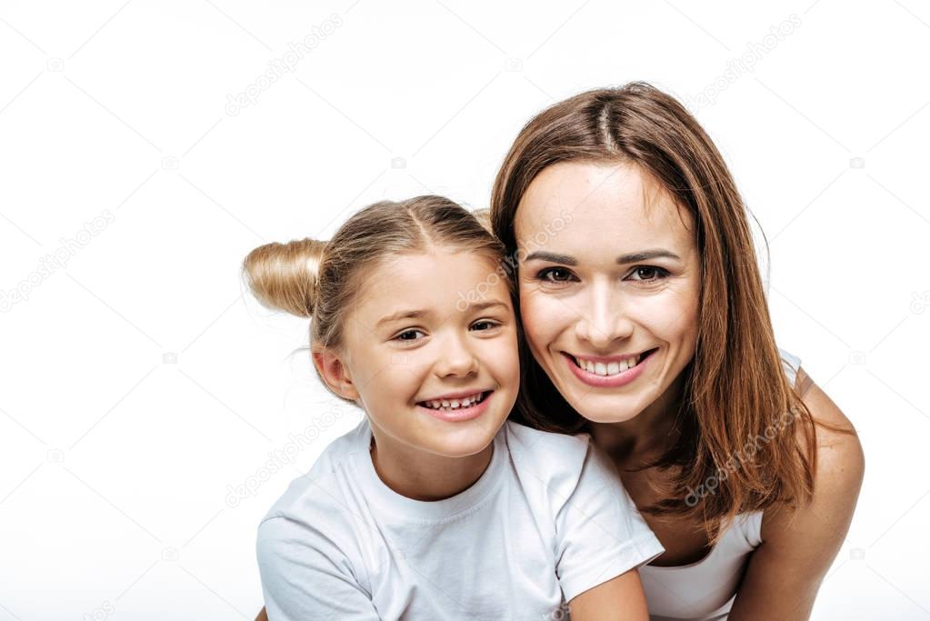 Smiling mother and daughter 