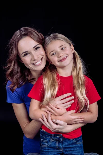 Beautiful smiling mother and daughter — Stock Photo, Image