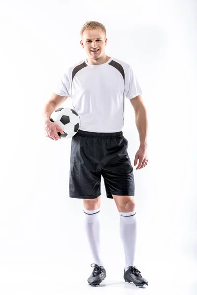 Jogador de futebol exercitando com bola — Fotografia de Stock
