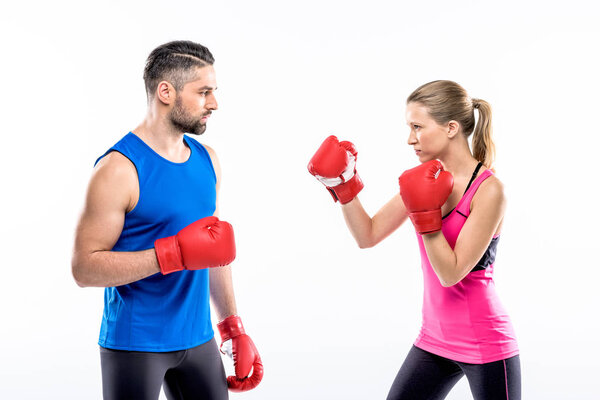 Man and woman boxing