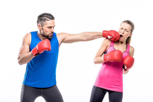 Man and woman boxing