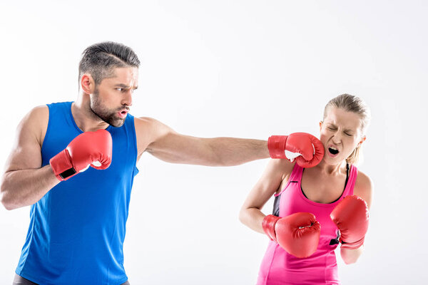 Man and woman boxing