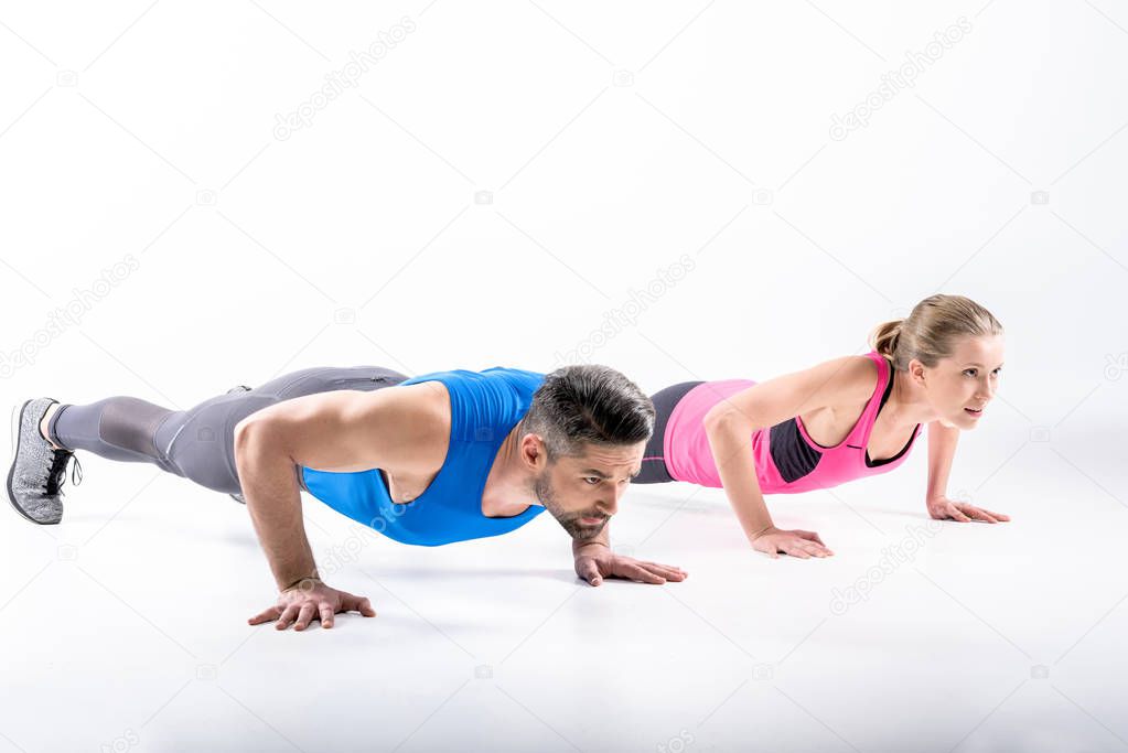 Couple doing push ups