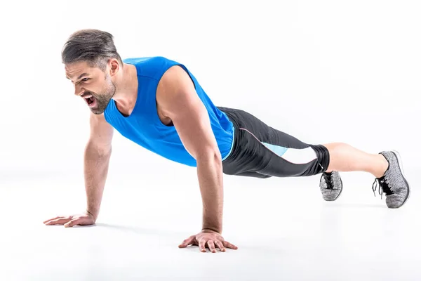 Homem fazendo exercício prancha — Fotografia de Stock