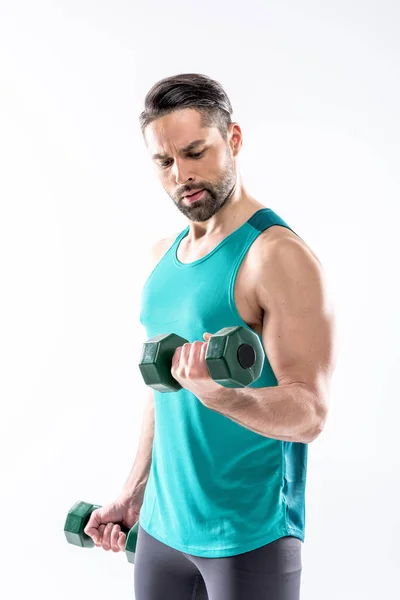 Man exercising with dumbbells — Stock Photo