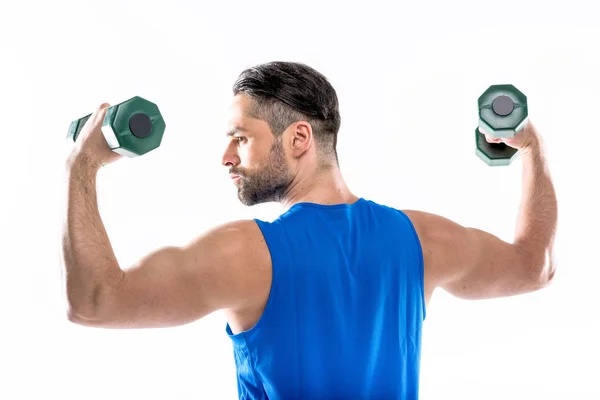 Man exercising with dumbbells — Stock Photo
