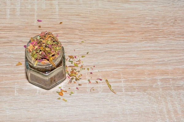 Health Tea - Dried crushed amaranth in a glass jar.