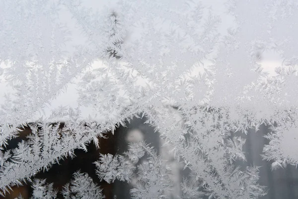 Текстура льда у окна — стоковое фото