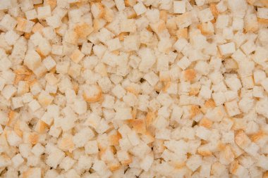 Ekmek kırıntılarının dokusu. Dilimlenmiş ekmek arka planda. Ekmek dokusu. Yakın plan krakerler..