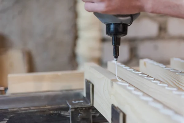 apply glue to the tree. glue the wooden board. glue the wood worktop.