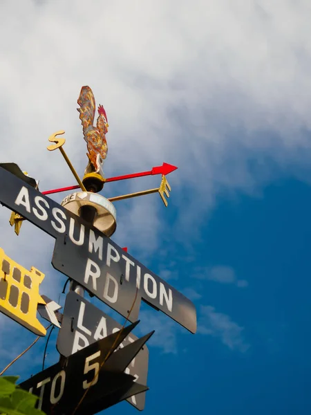 Rooster Weather vane - set against a blue sky and cloud — Stock Photo, Image