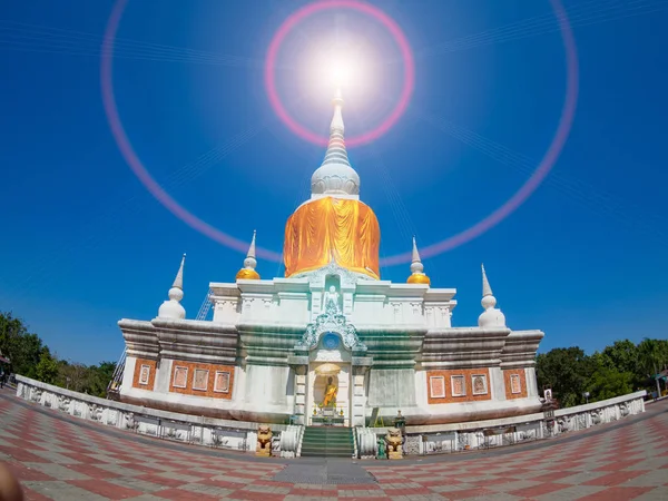 Ancient pagoda architecture In Thailand, Phra That Na Dun , Maha Sarakham Province with blue sky background and Lens Flare or sunspot — Stock Photo, Image