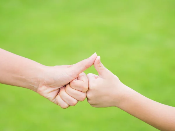 Mother and son are hand thumb up — Stock Photo, Image