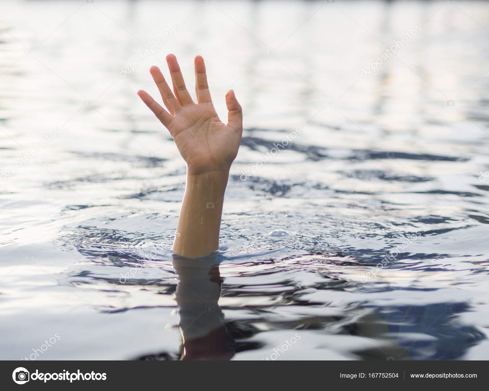 Drowning victims, Hand of drowning woman needing help. ⬇ Stock Photo, Image by © spukkato 167752504