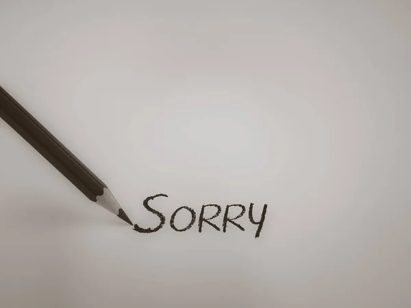 Sorry Text Konzept schreiben mit Bleistift auf weißem Hintergrund. — Stockfoto