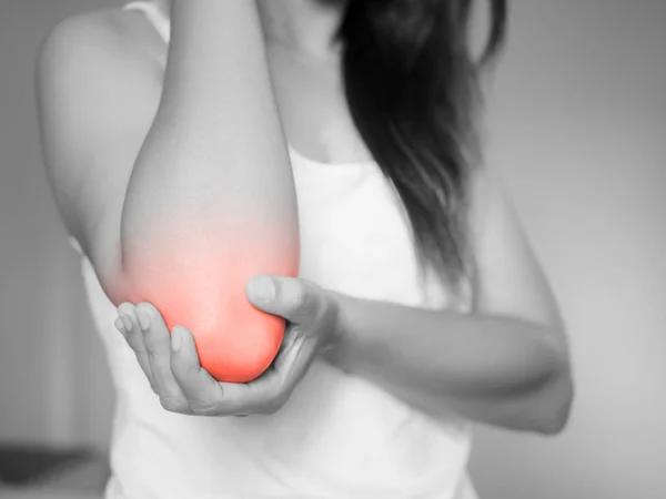 Closeup female's elbow. Arm pain and injury. — Stock Photo, Image