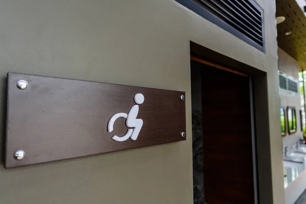 Close up disabled toilet sign and symbols — Stock Photo, Image