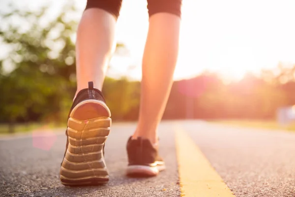 Healthy lifestyle sports woman legs running and walking — Stock Photo, Image