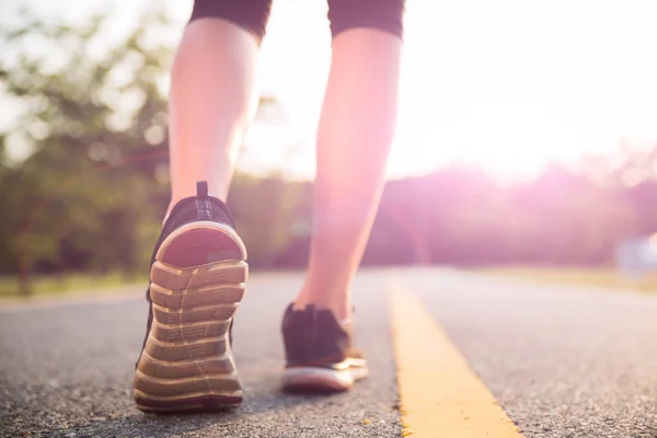 Healthy lifestyle sports woman legs running and walking — Stock Photo, Image