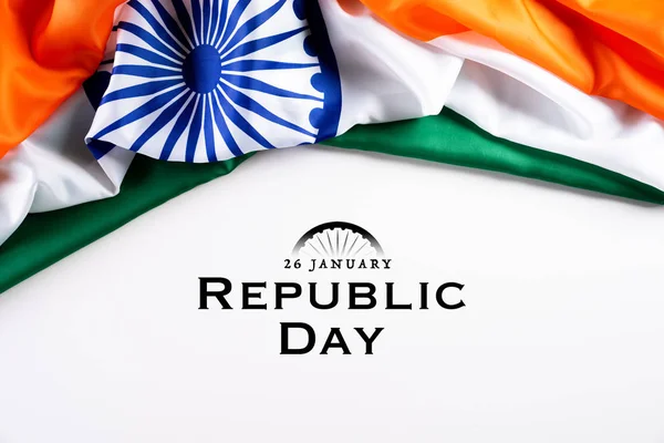 Indian republic day concept. Indian flag with the text Happy republic day against a white background. 26 January.