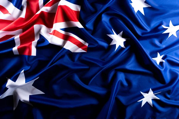 Australië dag concept. Australische vlag met de tekst Happy Australia dag tegen een schoolbord achtergrond. 26 januari. — Stockfoto