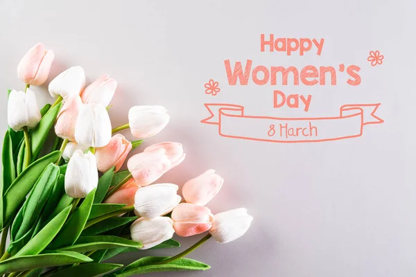 International Women's Day concept. Pink and white tulips on gray — 스톡 사진