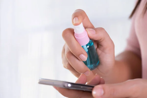 Closeup Woman Hands Using Alcohol Spray Cleaning Smart Phone Coronavirus — Stock Photo, Image