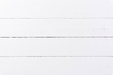 Boşluklu beyaz ahşap dokunun üst görünümü.