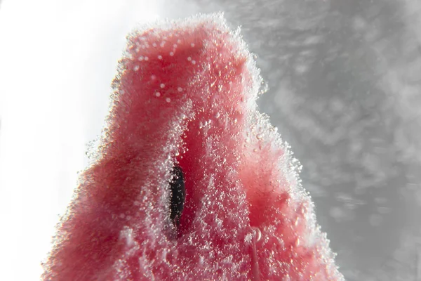 Watermelon slice in bubbles in water — Stock Photo, Image