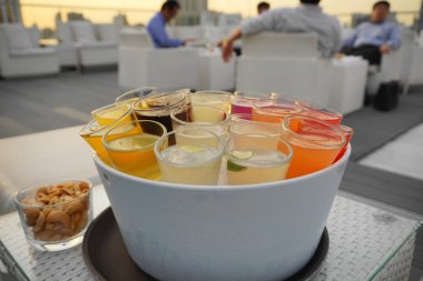 rainbow cocktail serve in ice bucket clipart