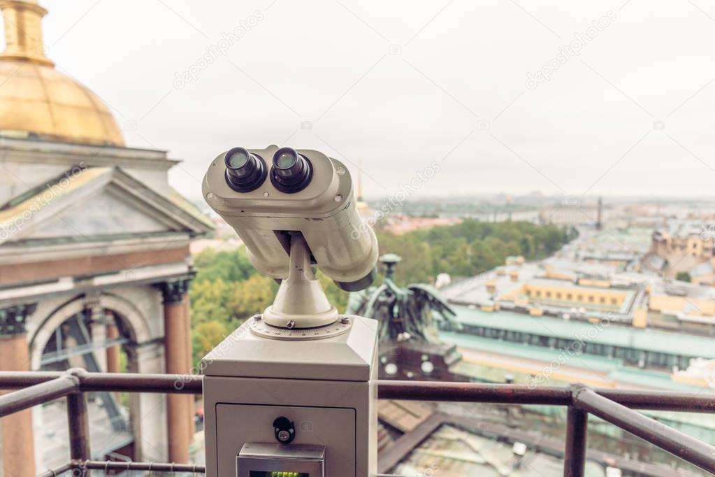 Binoculars on the observation deck on the roof of St. Isaac's Cathedral in St. Petersburg