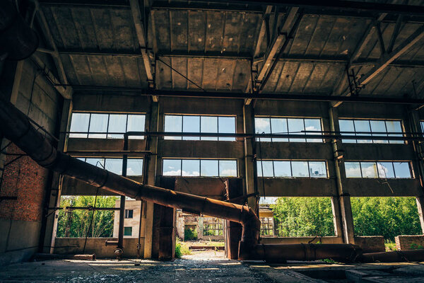 Abandoned factory, big warehouse with large windows