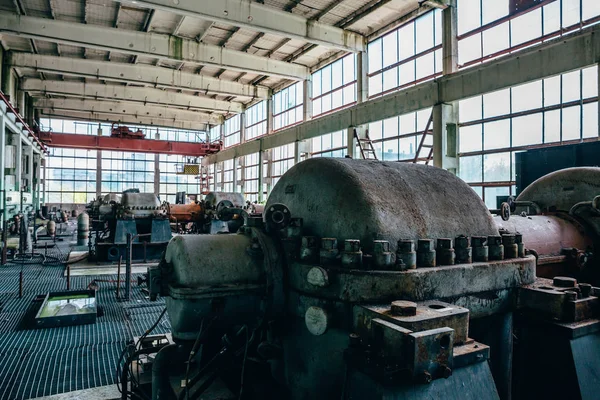 Large machines and equipment at an abandoned factory