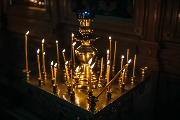 Church candles on dark background, selective focus — Stock Photo, Image