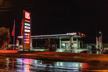 Voronezh, Russia - Circa October 2017: Lukoil gas station in Voronezh at night. LUKOIL is a Russian oil company clipart
