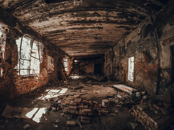 Ruins of old red brick abandoned building inside interior, dark creepy corridor — Stock Photo, Image