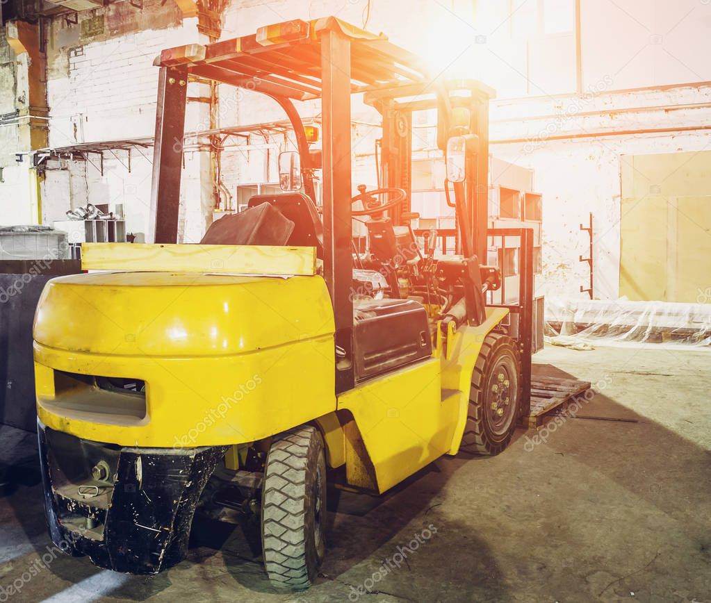 Forklift Truck inside warehouse or factory or logistics company