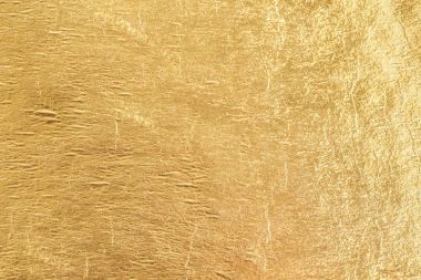 Altın parlak folyo arka plan, sarı parlak metalik dokusu