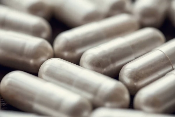 Tło medyczne tabletki i kapsułki, grupa leków, Selektywny fokus — Zdjęcie stockowe