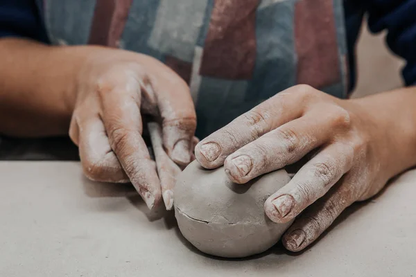 Female potter works with clay, craftsman hands close up — Stock Photo, Image